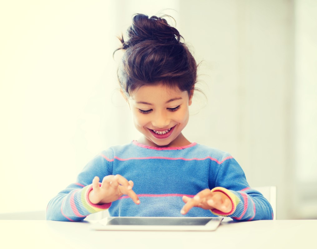 girl with tablet pc at home Girl With Tablet Pc At Home